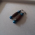 Kép 1/2 - Tibeti Dzi achát fülbevaló kék hematit-gyönggyel 6 cm